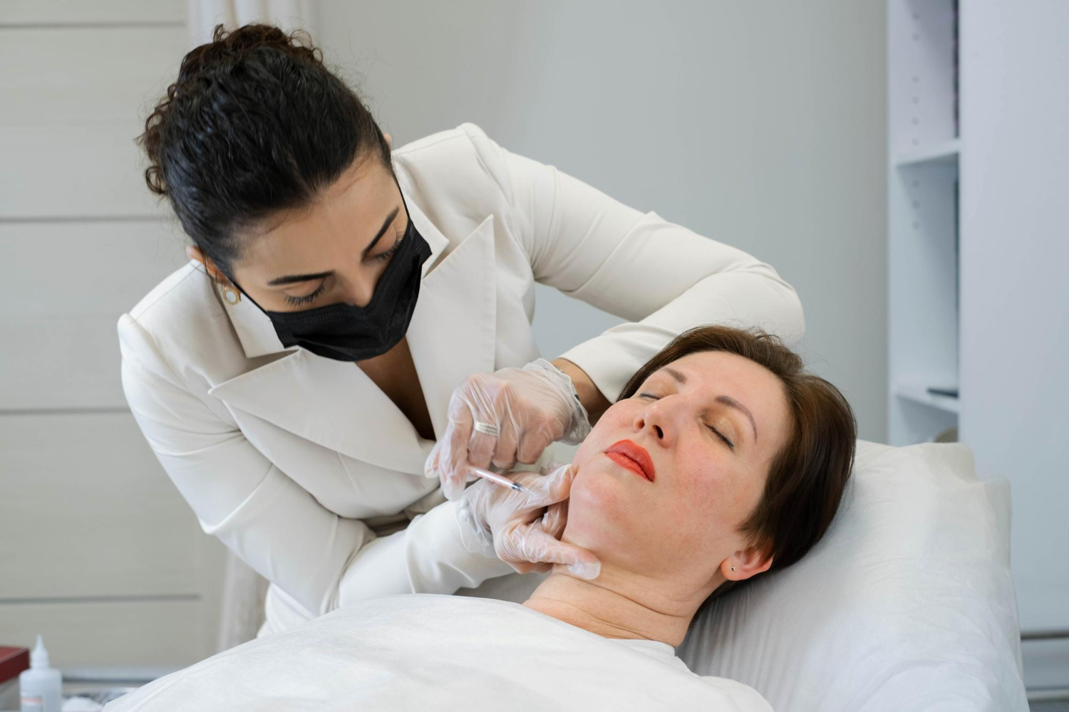 dermatologist performing botox treatment during seasonal offer at reveal clinics riyadh